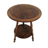 A late 19th century olive wood circular gypsy table,