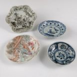 A collection of small Chinese saucers, a teapot stand, etc.