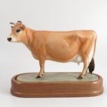 A Royal Worcester limited edition model, Jersey Cow, modelled by Doris Lindner,