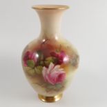 A Royal Worcester vase, decorated with roses by P Austin, shape number H290, dated 1924,