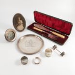 A collection of silver items, to include two photograph frames,