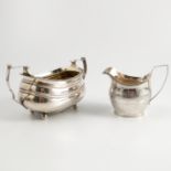 A Georgian silver cream jug, with ribbed edge and bright cut decoration, London 1808, weight 3oz,