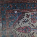 An Oriental style runner, decorated in red and blue to a white ground field,