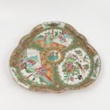 A Chinese Cantonese porcelain triform plate, decorated with figures, birds and insects,