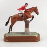 A Royal Worcester limited edition model, Foxhunter and Lt. Col. H M Llewellyn C.B.