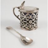 A Victorian silver mustard pot, with engraved hinged lid and pierced body,