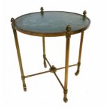 A gilt metal circular occasional table, with leather insert and cross stretchers, diameter 16.
