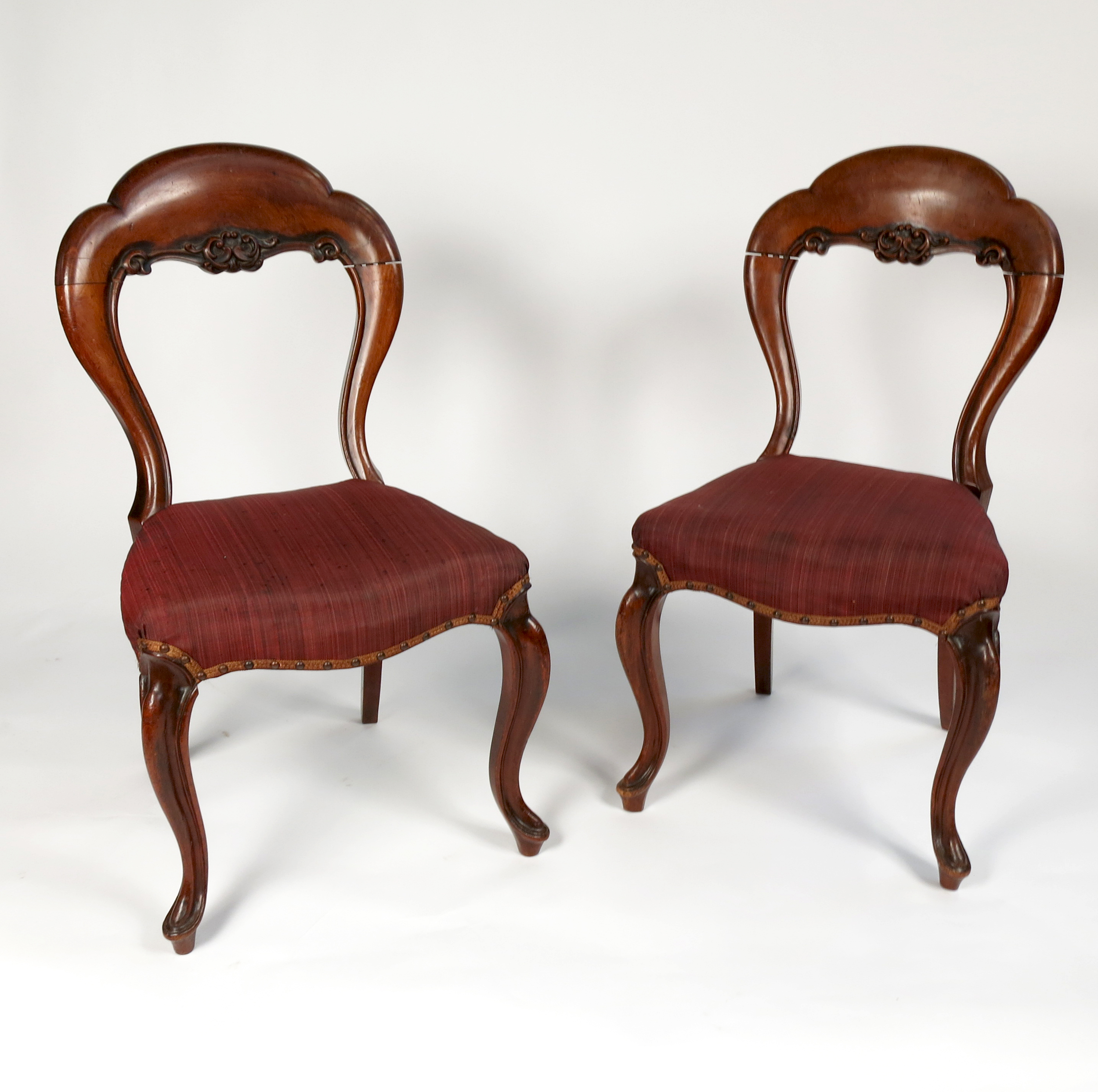 A harlequin set of Victorian dining chairs,