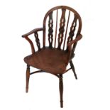 Three 19th century yew wood Windsor armchairs,