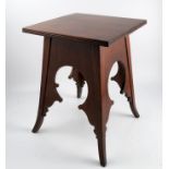 An Arts and Crafts Liberty style Moorish walnut low table,