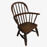 An Antique miniature elm Windsor chair,