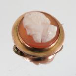 A Victorian hardstone cameo brooch, the circular stone carved with a male in profile,