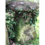 A staddle stone and cap,