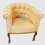 An Edwardian buttonback tub chair, of horseshoe shape,