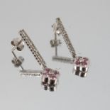A pair of 9 carat white gold diamond and pink stone drop earrings,