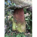 A staddle stone and cap,