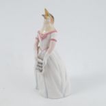 An unmarked Royal Worcester candle snuffer, modelled as Jenny Lynd, height 4.