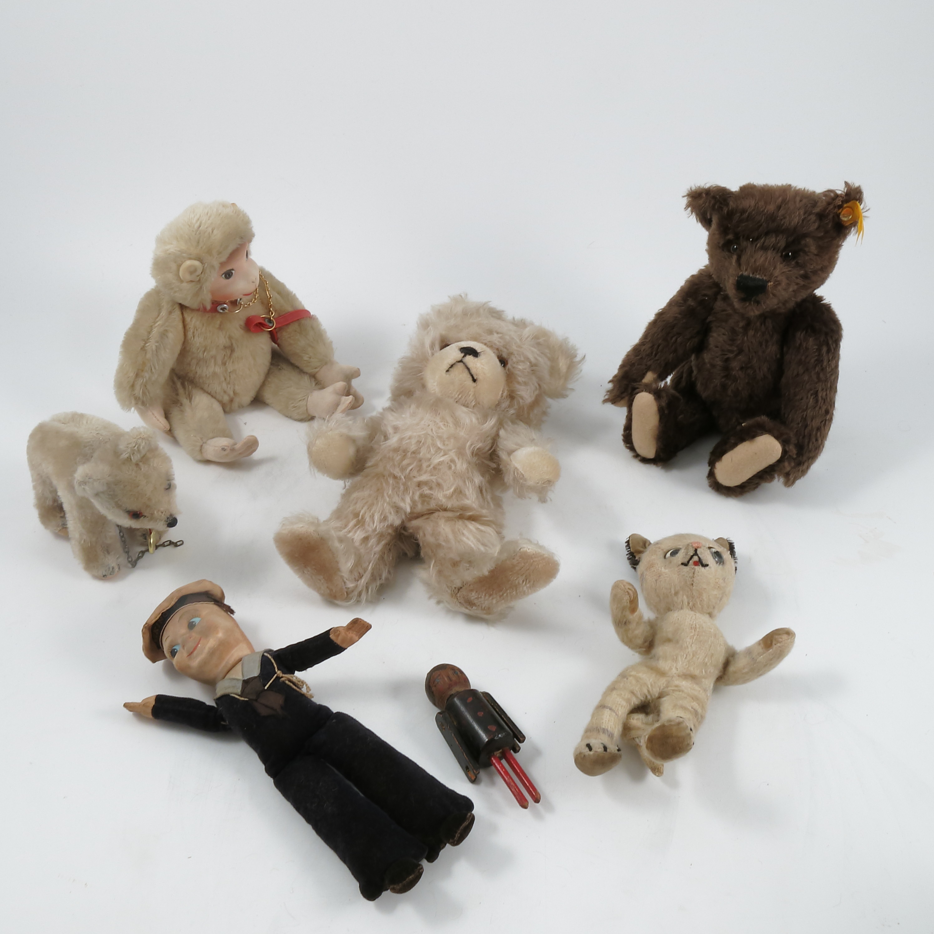 A modern Steiff teddy bear, together with a Steiff lamb and bear,