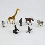 A collection of painted lead animals, to include a Giraffe by J Hill & Co, a zebra, a moose af,