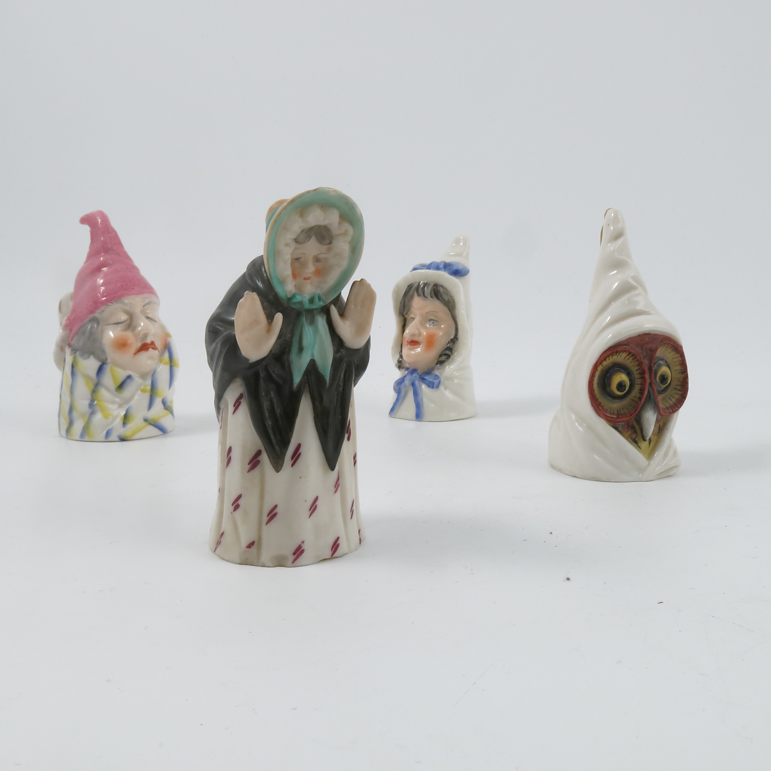 Four Royal Worcester candle snuffers, Mr and Mrs Caudle, date letter N and S, Owl, dated 1893,