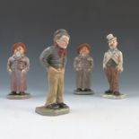 Four Royal Worcester figures, from the down and out series, with impressed marks, restored and af,