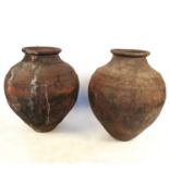 Three pottery olive jars,