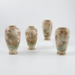 A pair of Satuma pottery vases, decorated with flowering trees and birds, seal mark to base,