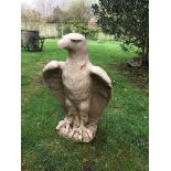 A glazed stone garden eagle,