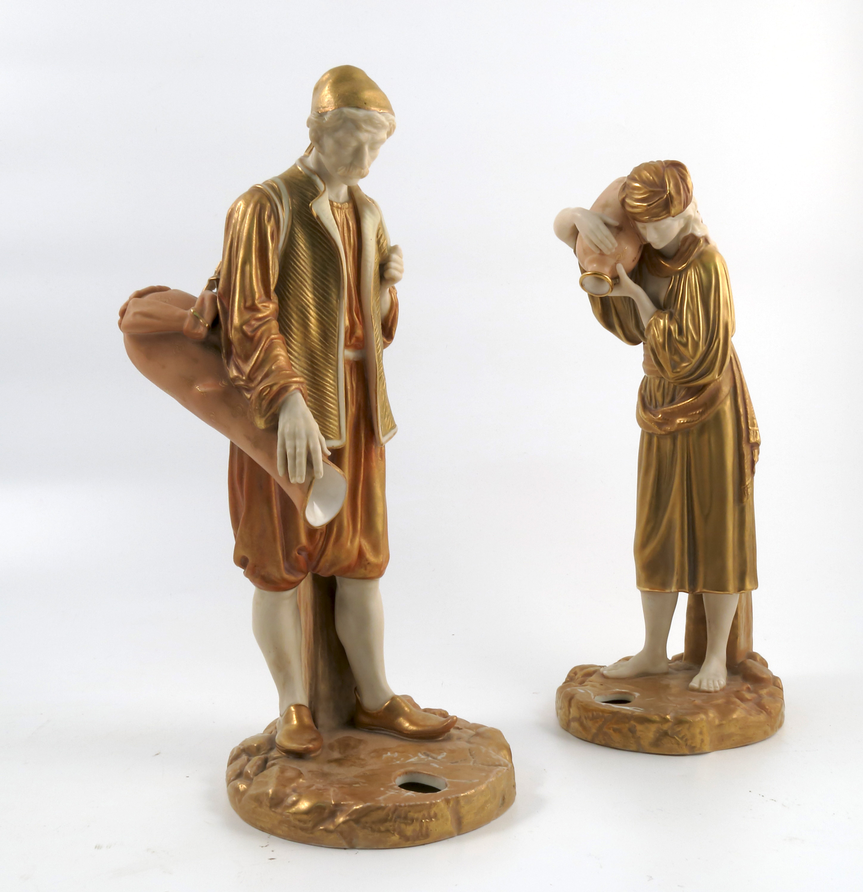 A pair of Royal Worcester figures, of Eastern water carriers, decorated in gilt and shot silk,
