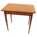 A Biedermeier style table, of rectangular form, raised on square tapering legs,