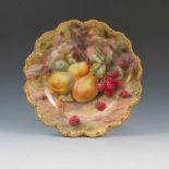 Two Royal Worcester plates, decorated with fruit to a mossy background by T Lockyear,