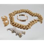 A Monet gilt metal chain link necklace, boxed, a paste set big cat brooch,