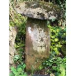 A staddle stone and cap,