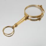 A pair of gilt metal lorgnettes,