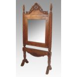 A large French style cheval mirror, with carved top and twist columns, width 40ins,