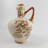 A Royal Worcester ivory vase, with gilt rim and handle, decorated with flowers, shape number 1042,