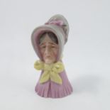 A Royal Worcester candle snuffer, Old Lady's Head, factory mark with unclear date code,