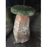 A staddle stone and cap