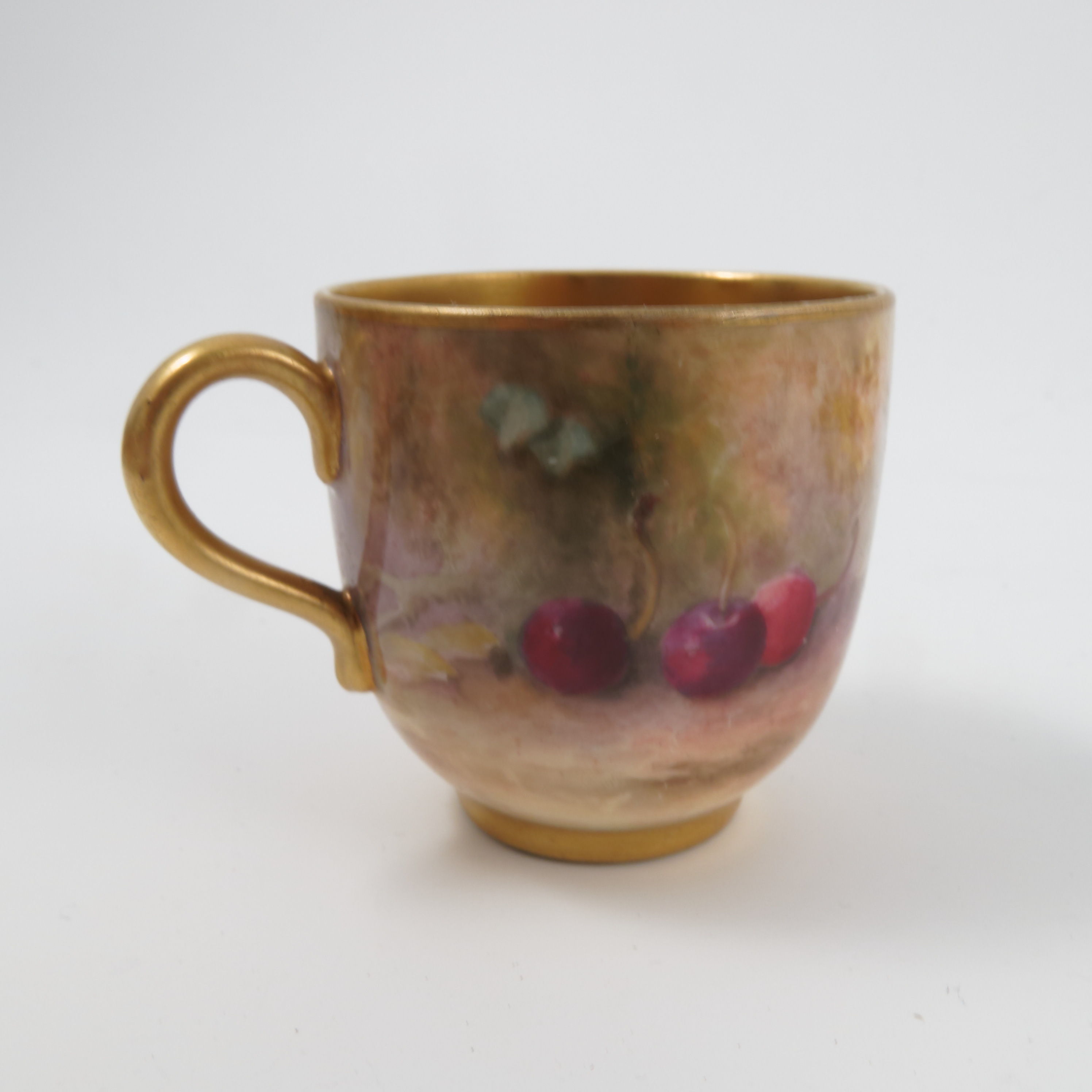 A Royal Worcester cabinet cup and saucer, decorated with fruit to a mossy background by Ricketts, - Image 3 of 3
