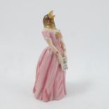 A Royal Worcester candle snuffer, 'Confidence', as Jenny Lind, pink dress,