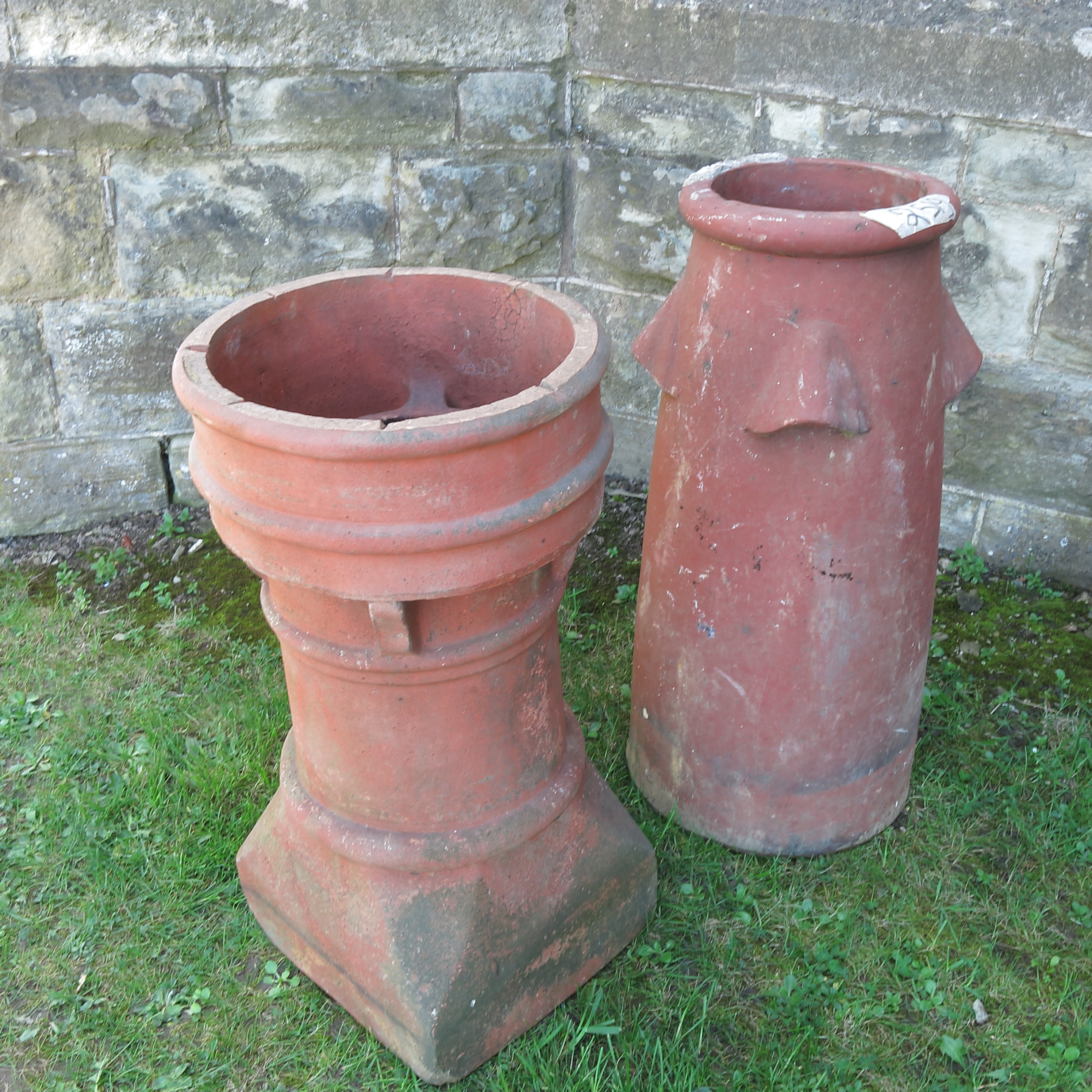 A collection of terracotta chimney pots,