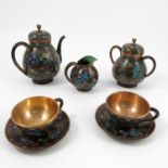 A cloisonne tea set, comprising tea pot, two handled covered sugar bowl, milk jug,