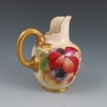 A Royal Worcester flat back jug, hand painted with autumn berries and leaves, signed K Blake,
