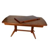 A 1960's Gordon Russell R818 rosewood extending dining table, made by F W Turner,