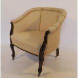 An Edwardian tub chair, of horseshoe form, with show wood frame,