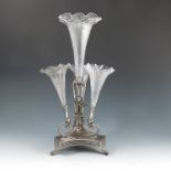 A 19th century silver plated and glass epergne, having a central glass trumpet with flared rim,