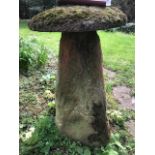 A staddle stone and cap,