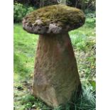 A staddle stone and cap,