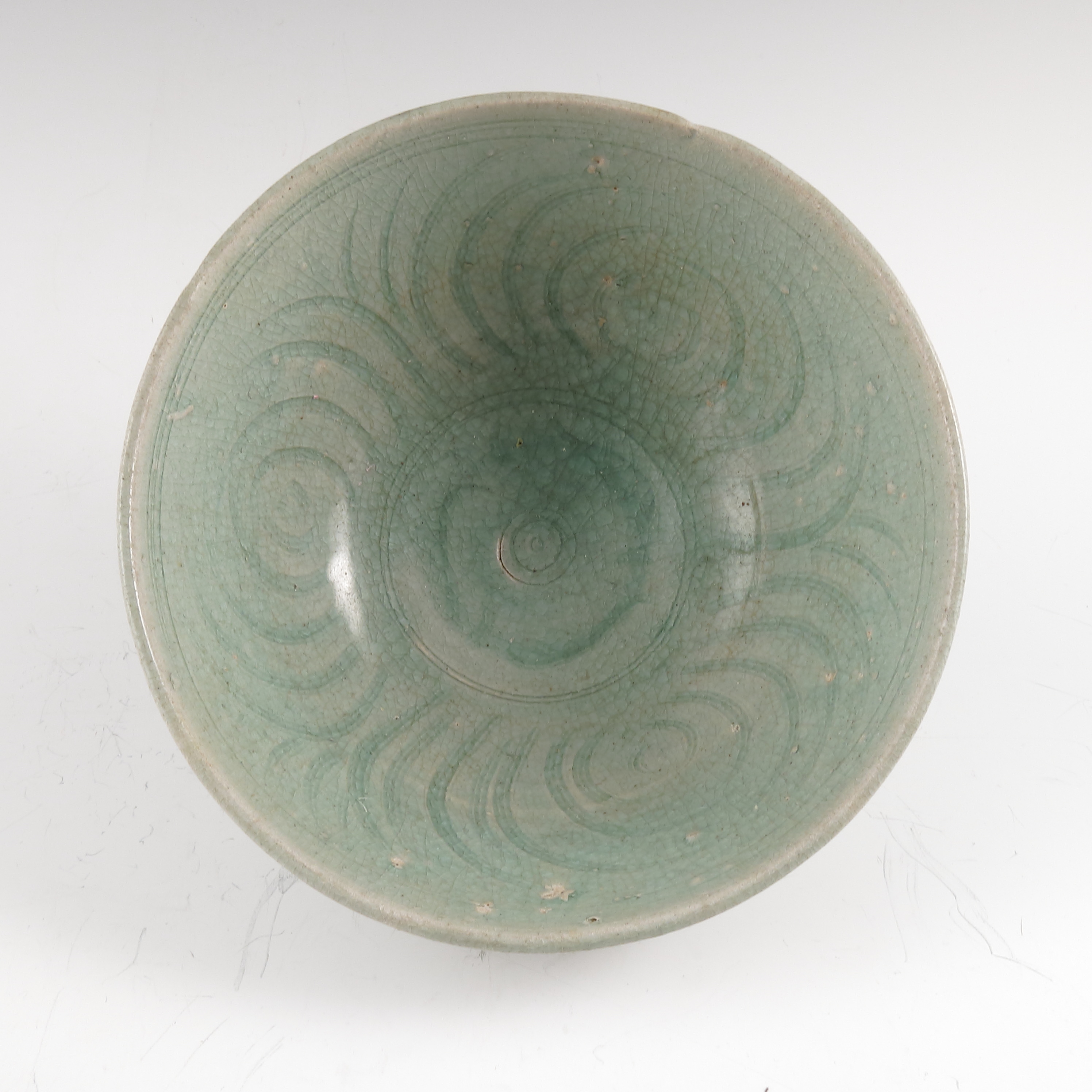 A Chinese provincial green glaze bowl, decorated with light green ground,