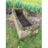 A rectangular stone garden trough,